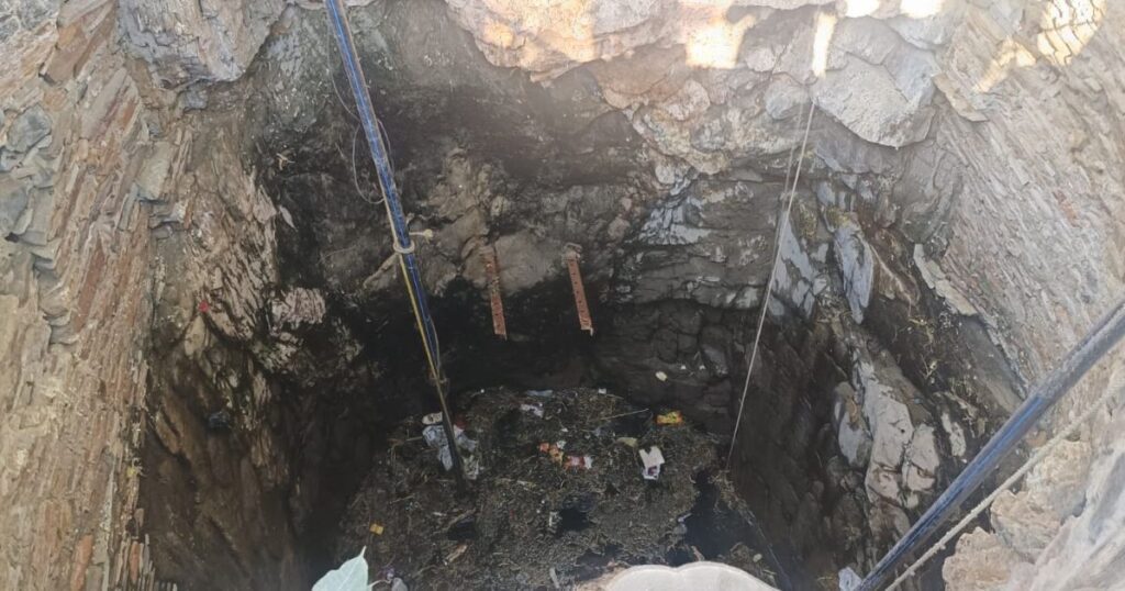 The body of a young man working at a medical store was found floating in a well.